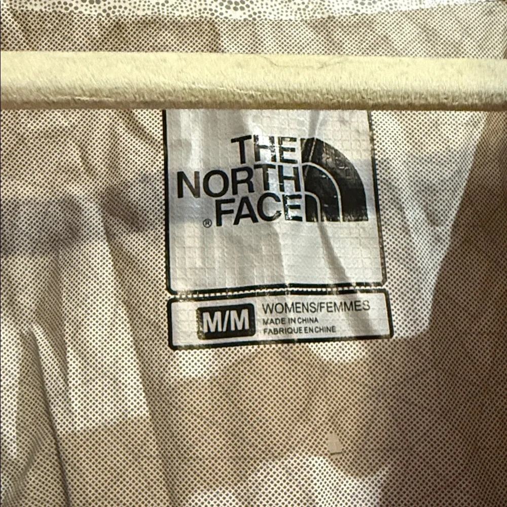 The North Face Women's White Geometric Ski Jacket with Red Zipper